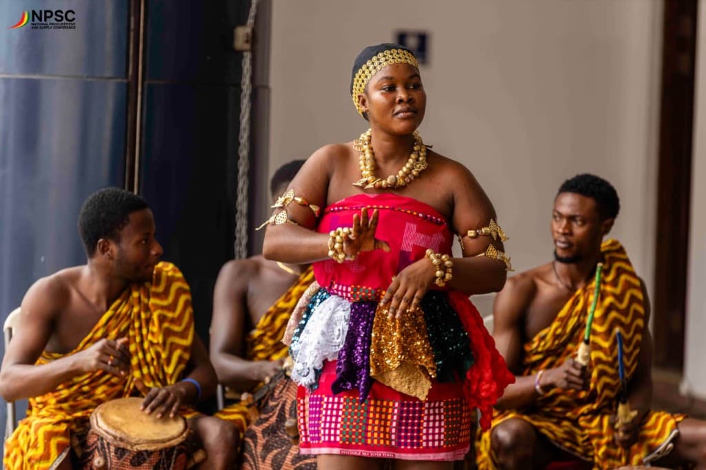 Cultural performance at NPSC with drummers and a dancer